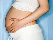 Pic of pregnant woman with gum disease and a risk for a low birth weight baby.